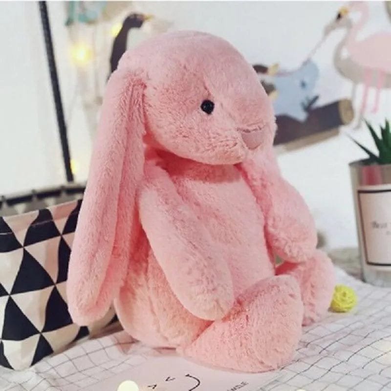 Pink plush bunny toy.