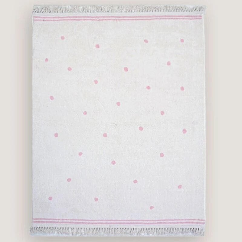 White towel with pink polka dots.