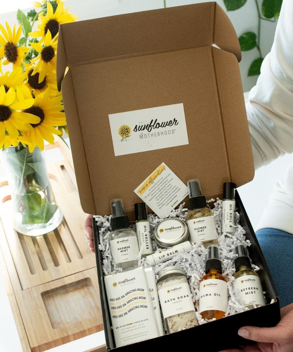 Deluxe Self Care Gift Box product shot of the spa-inspired Sunflower Motherhood set for baby showers.