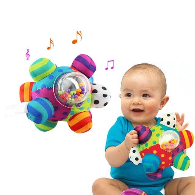 Baby playing with the Soft Infant Crib Bed Stroller Toy Spiral featuring plush cloud charms for tactile play.