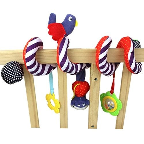 Soft Infant Crib Bed Stroller Toy Spiral with bird design and varied textures fitted to a wooden crib bar.