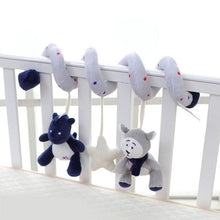 Soft Infant Crib Bed Stroller Toy Spiral rattles hanging from the crib rail for sound and grasp play.