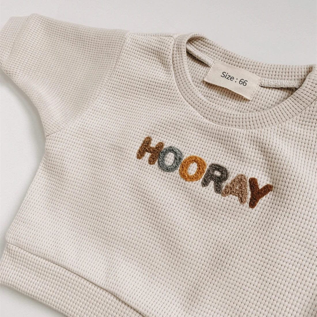 Spring Baby Set Newborn Sweatshirt and Pants Outfit Combo beige HOORAY sweater detail for soft, warm layering on cool days.