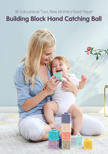Squeezable baby bath blocks held during play for water fun, teething relief and sensory development.
