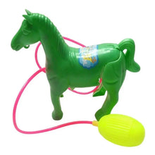 Green plastic horse toy with a pink tube and a yellow bulb on a white background