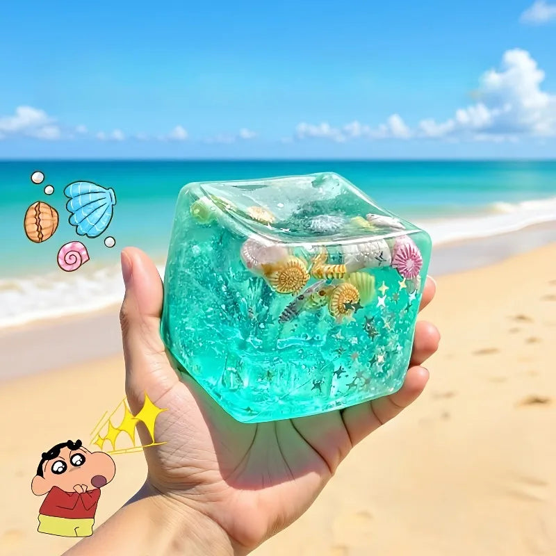 Squishy Transparent Star Maltose Fidget Toy in a clear cube with blue jelly filling for sensory play and stress relief.