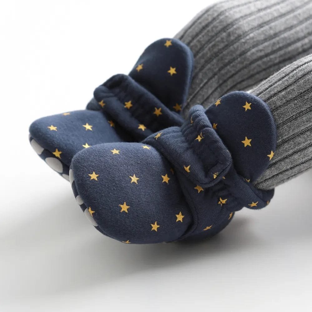 Star Newborn Socks Shoes star print pair flat lay for everyday indoor wear and cosy baby outfits.