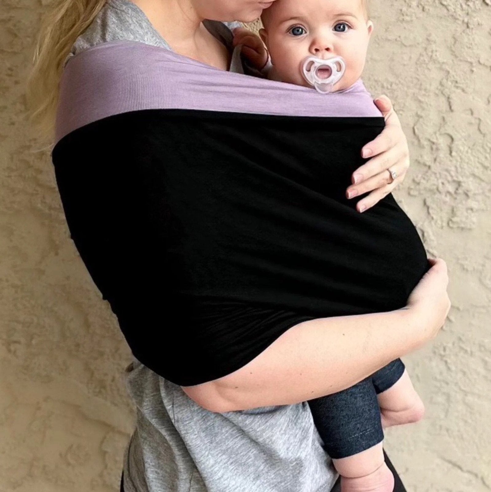 Stretchy Baby Carrier Sling black and purple wrap side view for secure newborn positioning during feeding and napping.