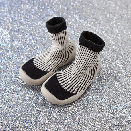 Pair of black and white striped socks 