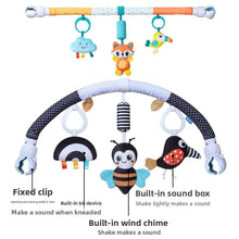 Stroller arch toy for infants with chimes and squeaker, features labeled for parents.