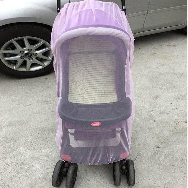 Stroller insect net stretched over a purple pram as an outdoor mesh barrier for garden and street walks.
