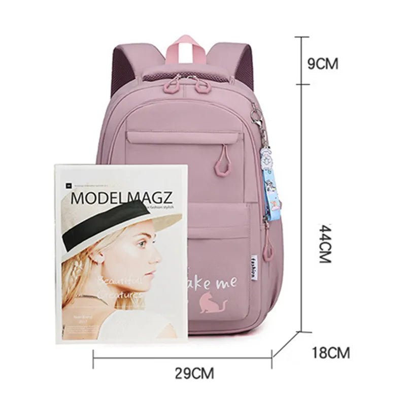 Pink backpack with dimensions labeled.