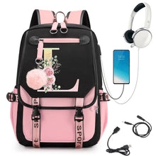 Pink and black backpack with floral design, smartphone, headphones, and USB cable.