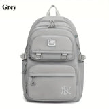 Gray backpack with visible branding 