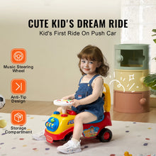 Child playing with a toy push car in a room with a safe and plant.