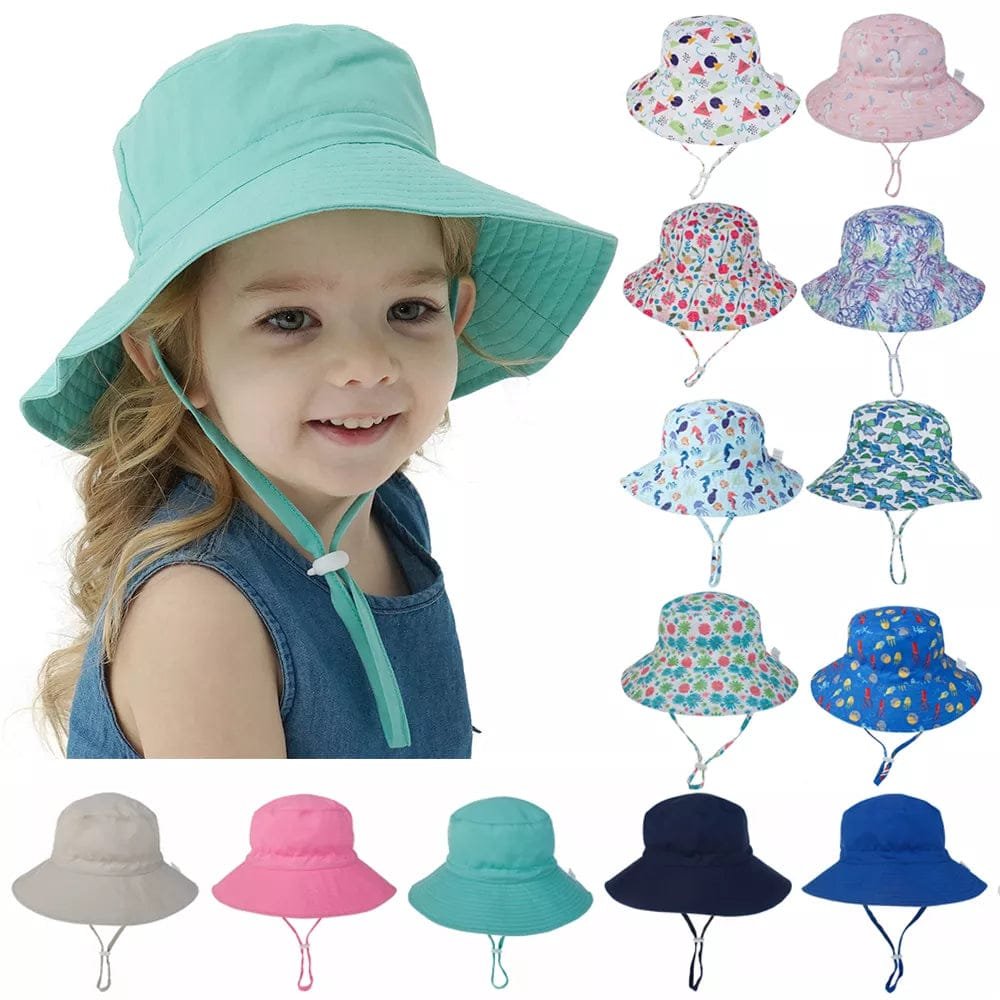 Summer Baby Sun Cap teal floral bucket hat worn by a child for UV protection during beach days and park outings.