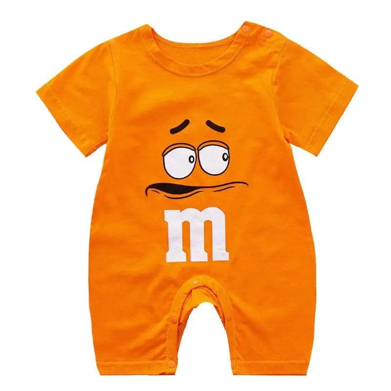 Orange baby romper with a cartoon face design 