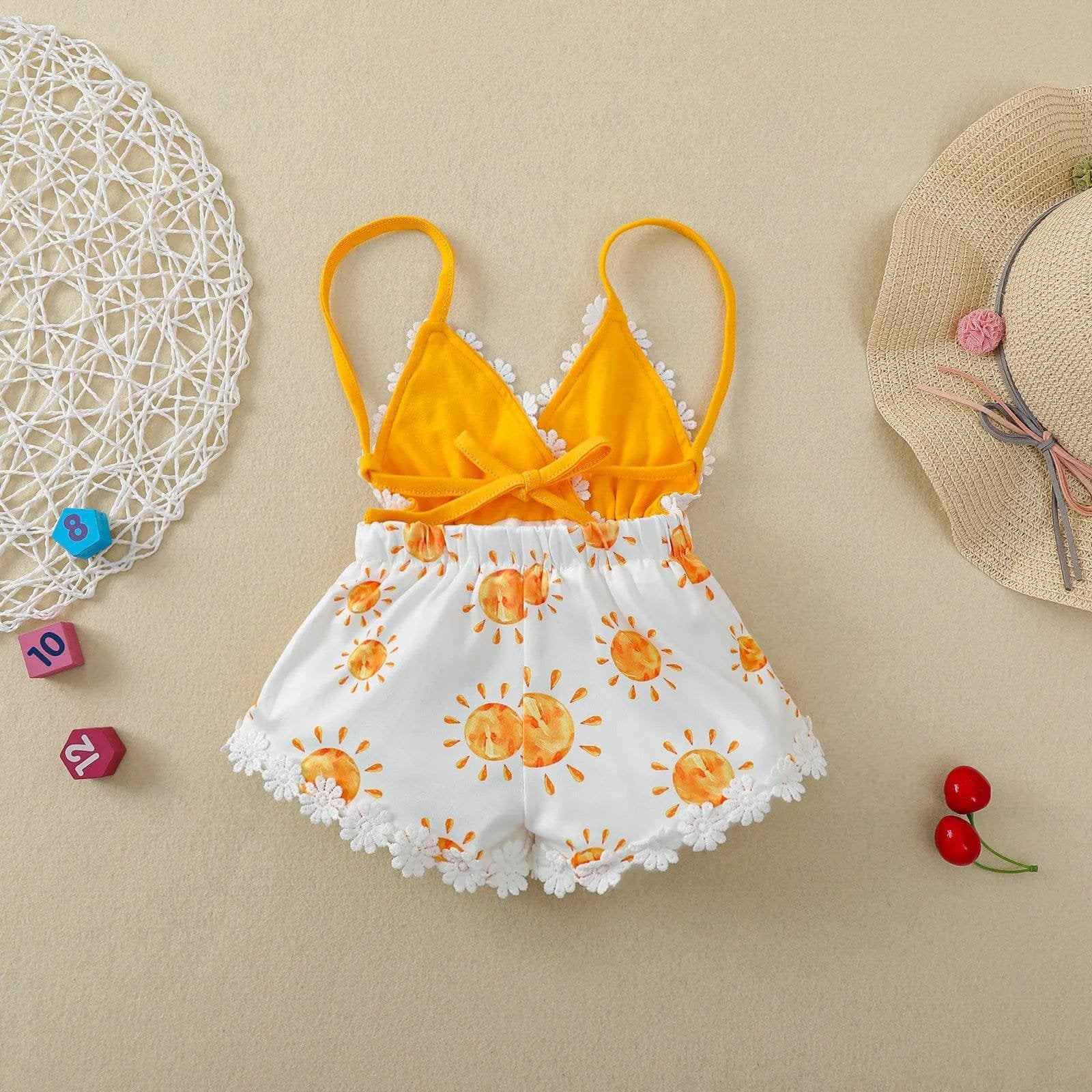 Summer Romper 0-4T sun print toddler girls outfit styled for summer photos, playdates, and family holidays.