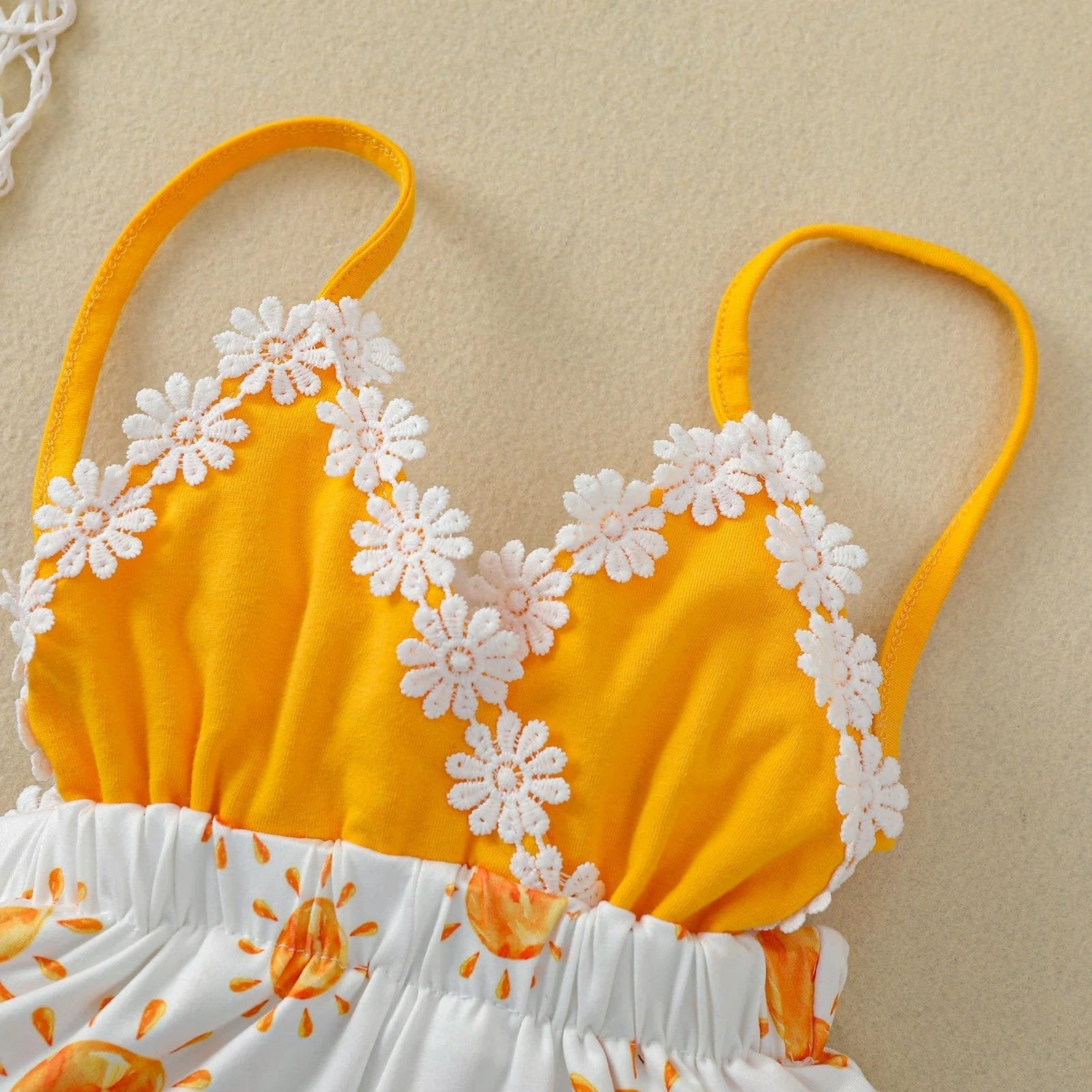 Summer Romper 0-4T yellow top with floral detail for lightweight summer comfort on baby and toddler girls.