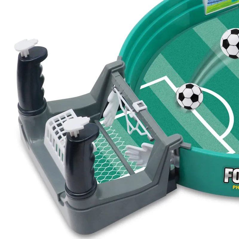Tabletop football goal and ball detail for scoring shots during party games and after-dinner matches.