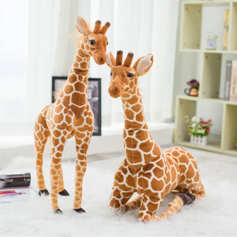 Two plush giraffes on a light-colored floor.