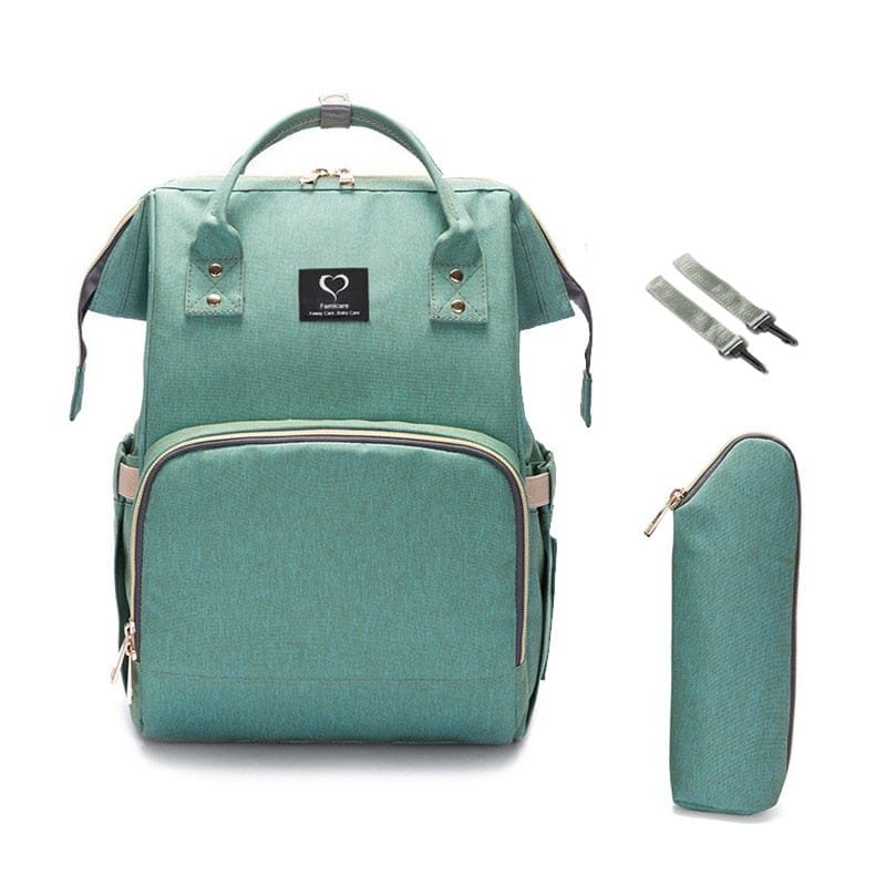 Teal maternity nursing backpack and diaper bag with pouch and stroller straps for hands-free baby outings and shopping trips.