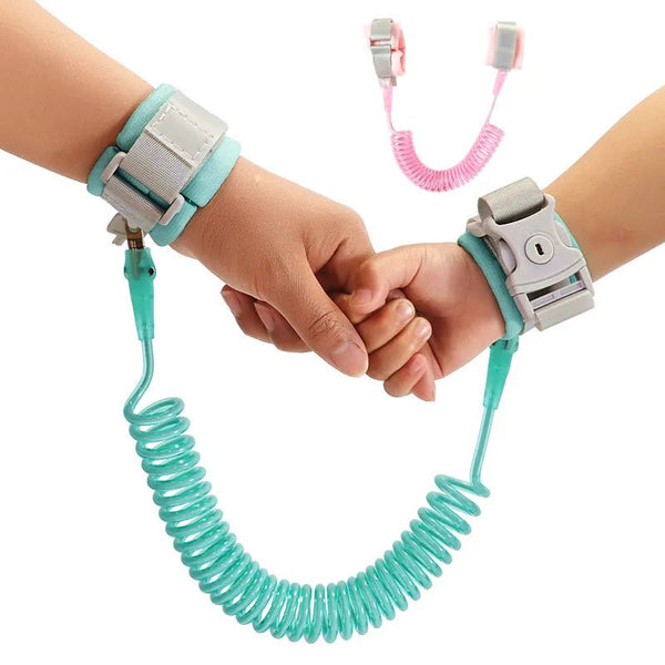 Child Safety Harness and Leash Butterfly design worn by two children holding hands during a family walk.