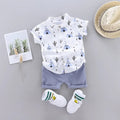 Children's outfit with t-shirt, shorts, socks, and hat