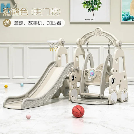 Children's playground set with slide and climbing structure on a light wooden floor.