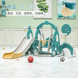 Children's playground set with slide, swing, and climbing structure in a room.