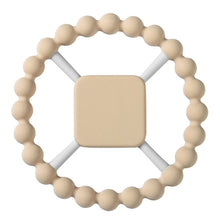 Beige teething ring with a square center