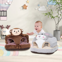 Toddler sitting on a shark-print training seat beside a monkey-print seat in a decorated nursery playroom.