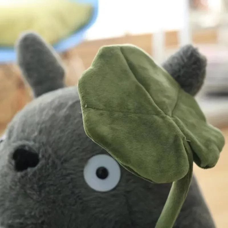 Totoro with Lotus Leaf Plush wearing its green leaf hat for kawaii gifting, room styling, and soft play.