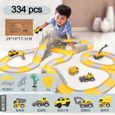 Child playing with a toy construction track set on a floor, with packaging and additional toys displayed.