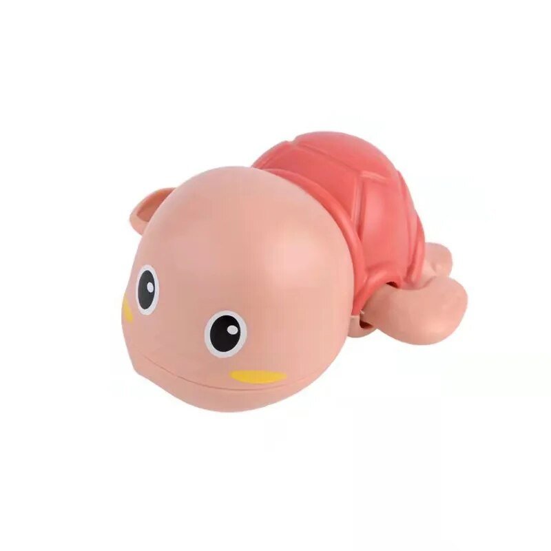 Toy figure of a baby with pink hair on a white background