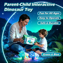 Smiling man and boy sitting on the ground with a dinosaur toy box and two gear dinosaurs
