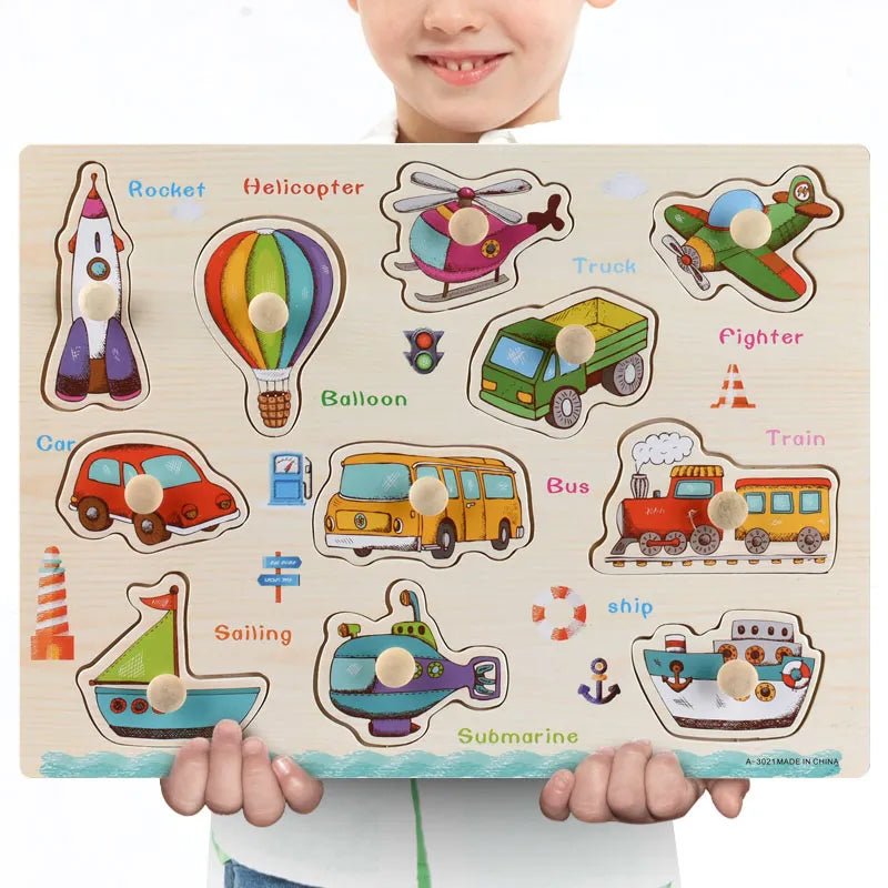 Child holding a Montessori wooden transportation puzzle with labeled pictures for hands-on vehicle learning.