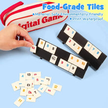 Hand placing a tile on a rummy rack with scattered number tiles below