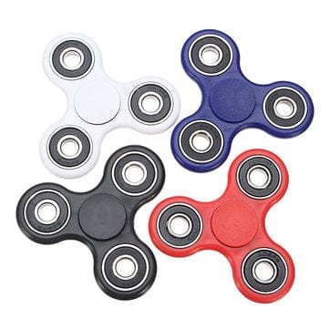 Tri-Spinner Fidget Toy set in four colours for ADHD and autism sensory support, stress relief, and focus.
