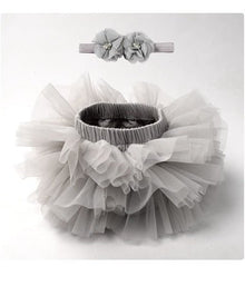 Front view of the grey tulle tutu bloomers diaper cover with headband for relaxed newborn dressing and photos.