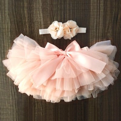 Princess-style pink tulle bloomer set for newborn girls to wear at christenings and first family gatherings.