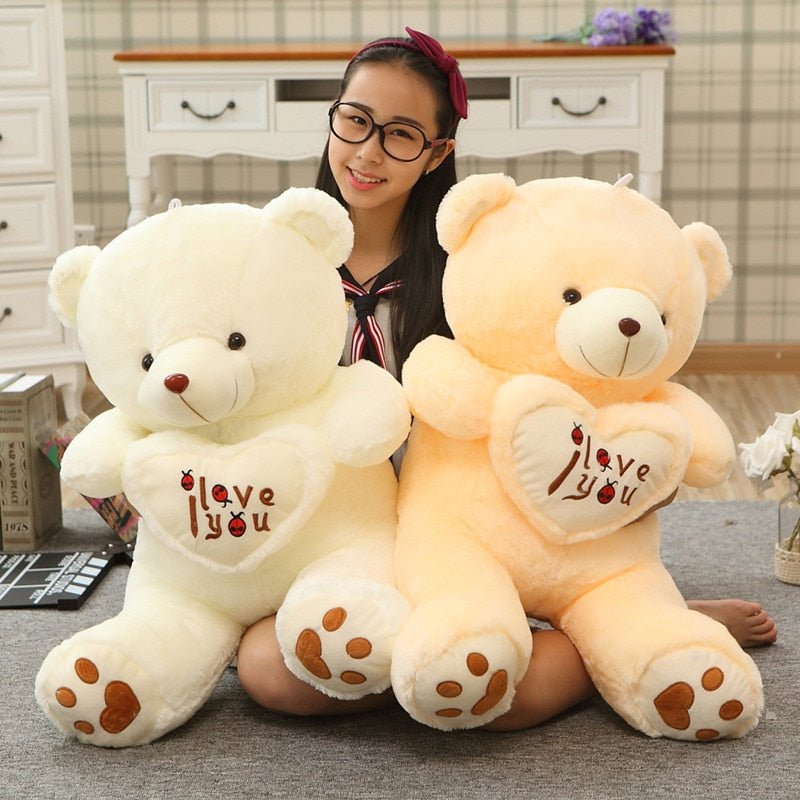 Two large I Love You teddy bears held together, giant plush toys for couples gifting and nursery cuddles.