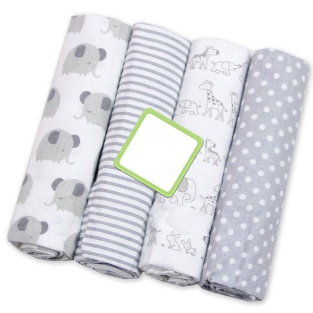 Ultra soft cotton muslin baby swaddles rolled in animal prints, breathable blankets for swaddling and warm-weather naps.