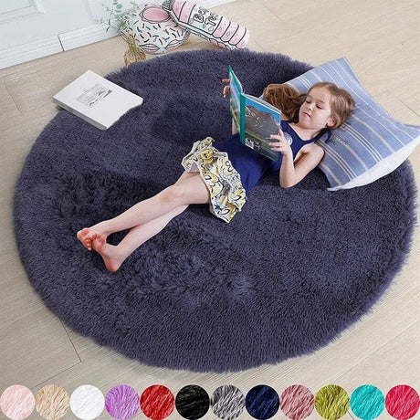 Child reading a book on a fluffy purple rug in a room.