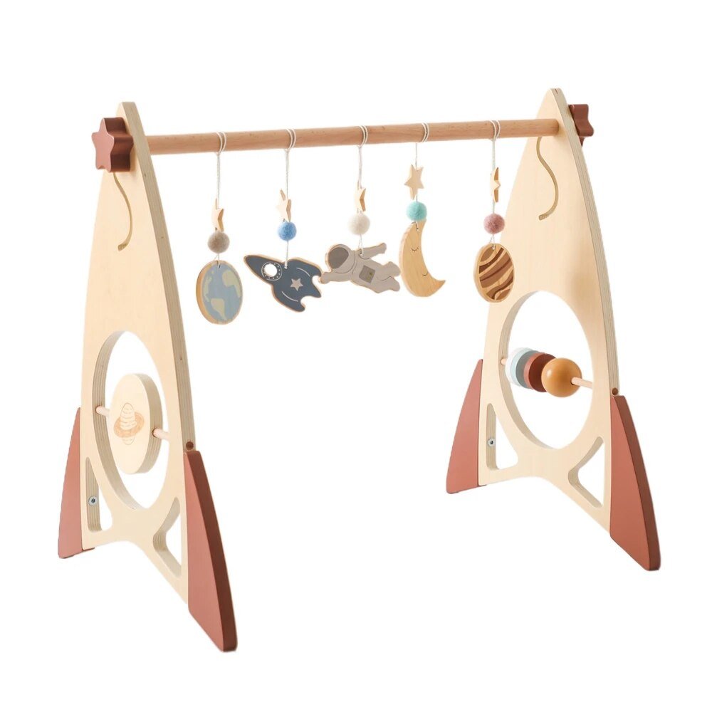 Unisex wooden baby play gym with hanging toys for neutral nursery styling and everyday sensory play.