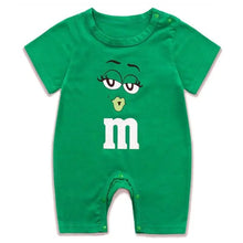 Green baby romper with M&M character design