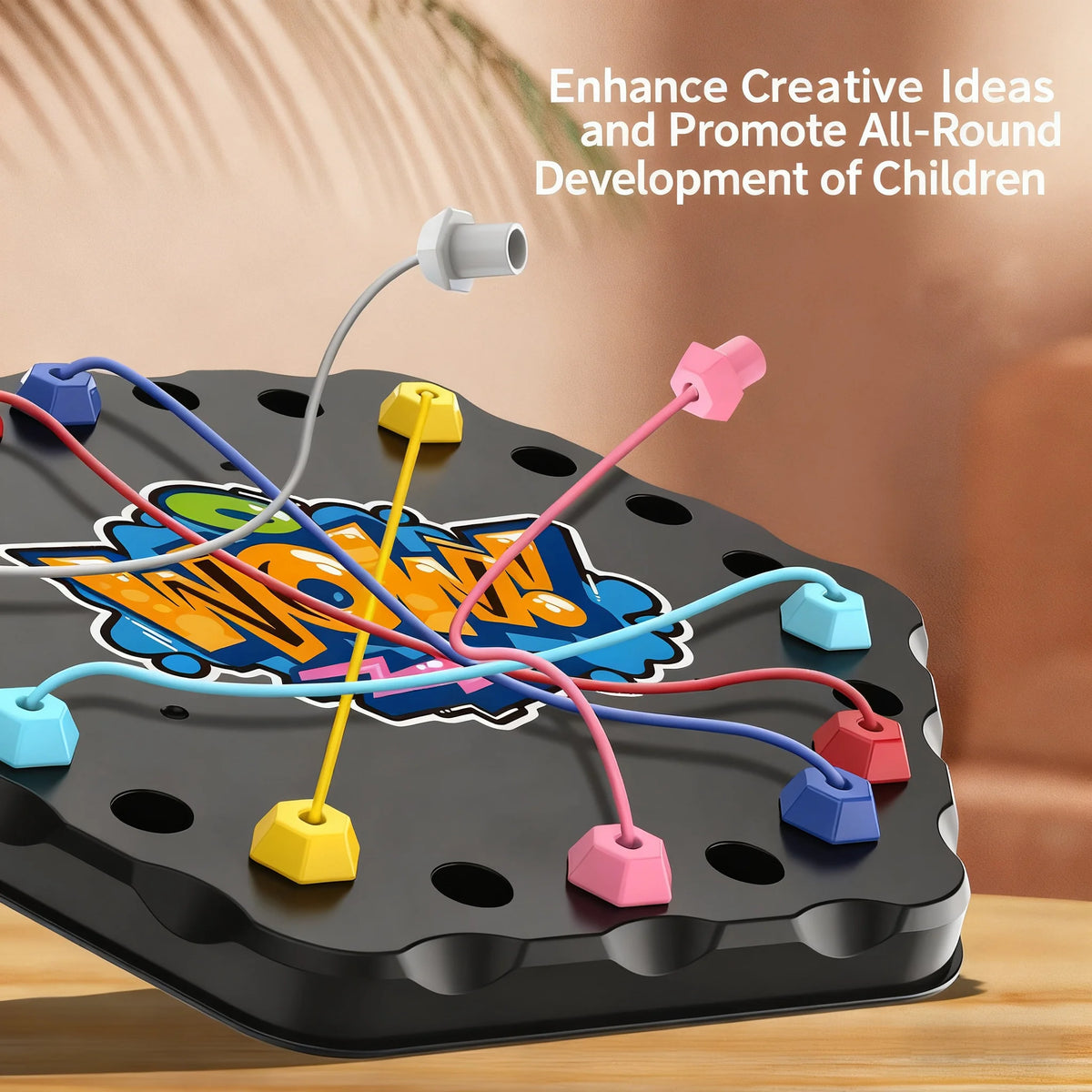 Close view of a hexagonal game board with a pink cord being pulled and a caption about creative ideas