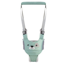 Walker Assistant Harness worn by a toddler for supported walking practice during park visits and indoor play.