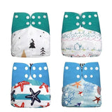 Four colorful baby diapers with different patterns