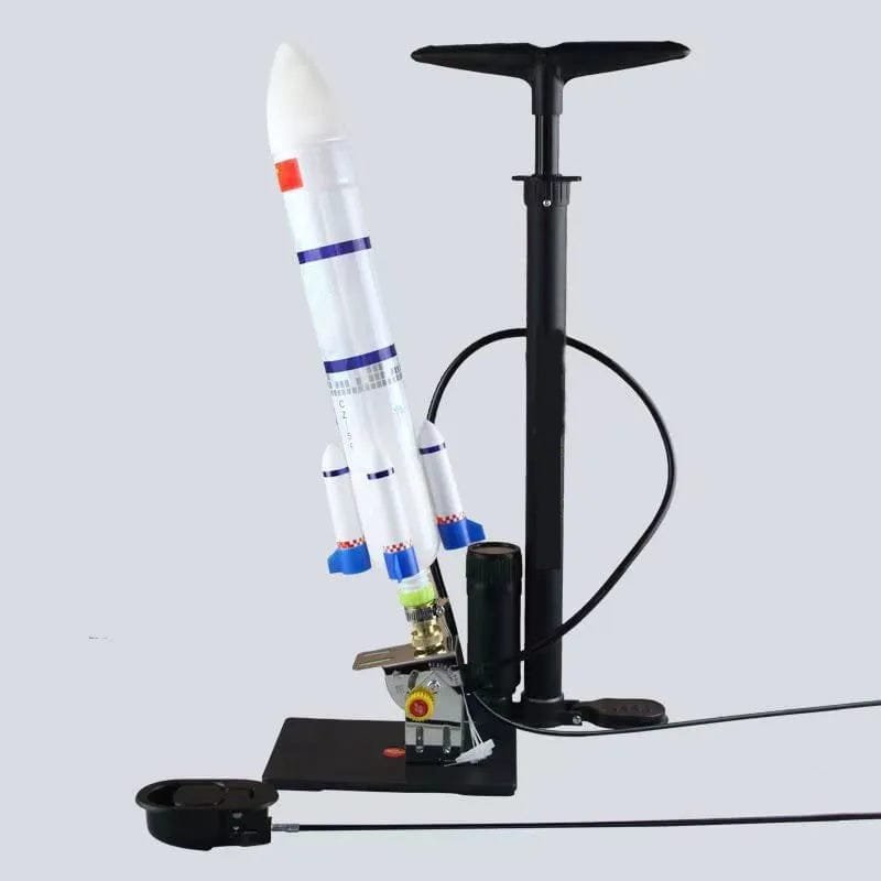 Water jet rocket launcher with stand and pump for backyard science play and outdoor summer fun.